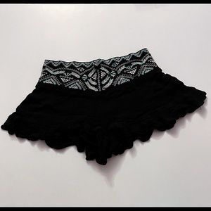 Cute black shorts, with ruffles and embroidery